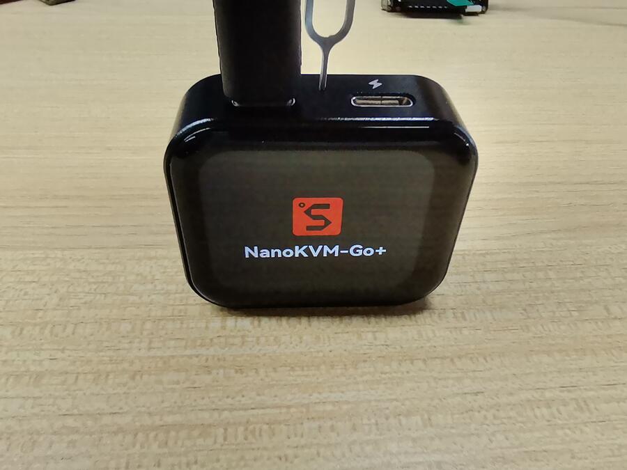 Hold Reset and connect the NanoKVM Go data port